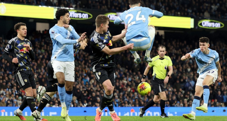 Manchester City po razburljivi tekmi bližje Arsenalu